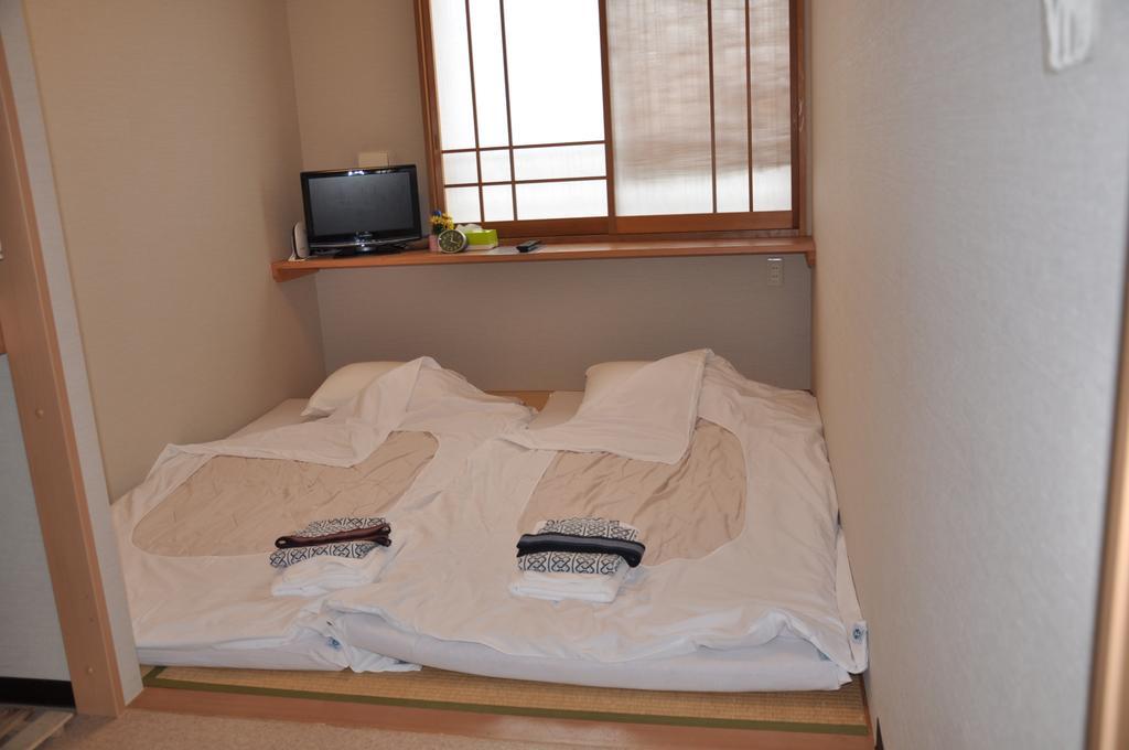 Family Inn Saiko Tokyo Bagian luar foto